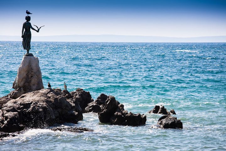 opatija girl with a bird
